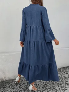 Back view of a blue Mori style V-neck tiered maxi dress with long bell sleeves