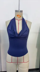 Close-up of a versatile dark blue halter neck tank top on a studio mannequin