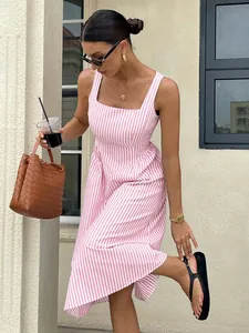 Detailed view of a pink and white striped French style sleeveless midi dress with square neck