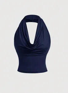 Detail of a navy blue halter neck tank top with elegant draped neckline and slim fit.