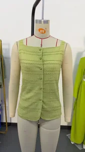 Detailed view of a lime green textured button-up sleeveless tank top shown on a mannequin