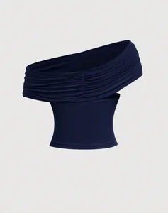 Detailed view of dark blue ruched off-shoulder cropped top with elegant fabric draping.
