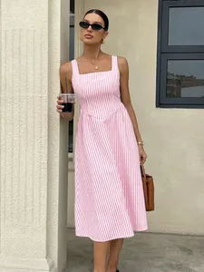 Elegant pink and white striped French style midi dress with square neckline on model
