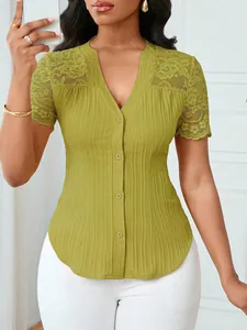 Detail view of olive green slim top featuring delicate lace sleeves and button-down front