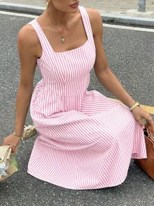 Detail of a French-style pink and white striped sleeveless maxi dress with a square neck.