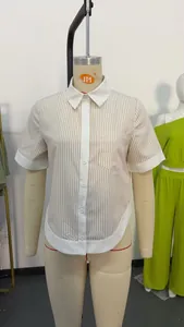 Vertical tan and white striped polo shirt with contrasting white collar and cuffs