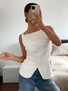 Close-up of white textured sleeveless vest with single-breasted buttons and slim fit
