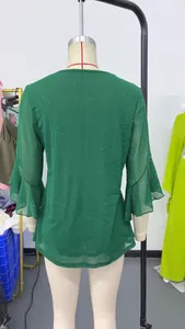 Elegant back view of green sequined mesh top featuring tiered ruffle bell sleeves for women