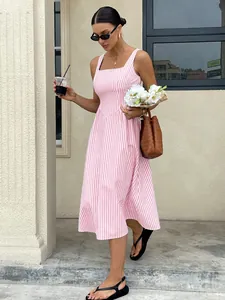 Detailed view of pink and white striped sleeveless midi dress with a square neck and flared skirt