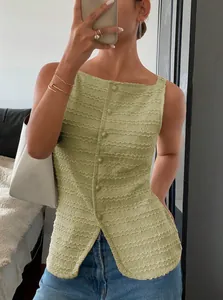 Detailed view of women's sage green textured sleeveless top featuring a button-front.