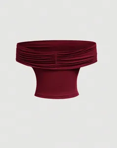Close-up detail of wine red ruched off-shoulder top showing soft fabric and elegant drape