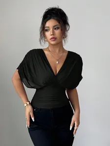 Elegant black V-neck top for women with flutter sleeves and ruched waist detail