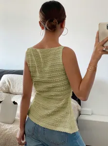 Rear view of a light green textured sleeveless slim top with a unique rippled fabric