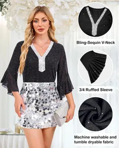 Detail showing the sequined V-neck, ruffled sleeves, and shimmering fabric of this top.