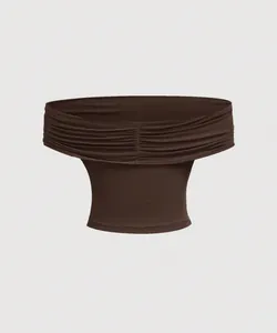 Close-up detail of a dark brown ruched off-the-shoulder crop top with elastic fabric texture
