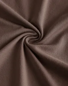 Detailed close-up of brown ribbed knit fabric showing soft texture for halter top