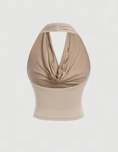 Detailed front view of a beige halter neck top featuring a sophisticated draped cowl neckline