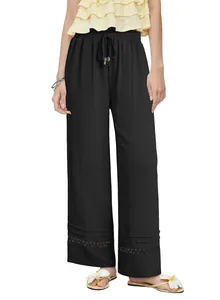 Full view of women's black high-waist wide-leg trousers with elegant lace hem detailing