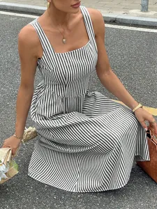 Detailed view of a French style striped maxi dress with square neck and sleeveless design