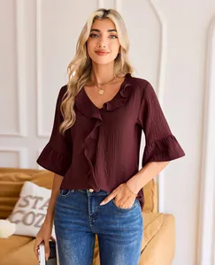 Elegant burgundy V-neck ruffle blouse with stylish flared sleeves for a casual look