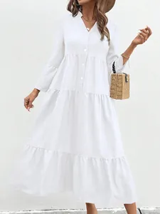 Elegant white V-neck tiered maxi dress with crinkle texture for a summer Mori style look
