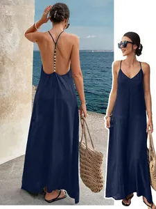Elegant navy blue V-neck backless maxi dress featuring vertical beaded back strap detail