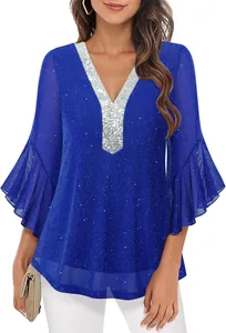 Close-up of royal blue sequined top with silver V-neck and ruffled bell sleeves