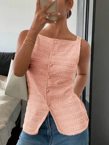 Women's pink textured sleeveless button-down top with a slim fit and chic summer style.