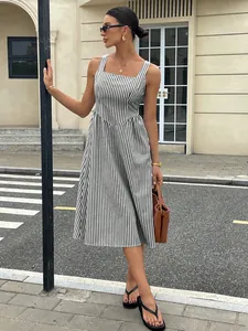 Full-length view of a striped sleeveless midi dress with a square neckline and cinched waist