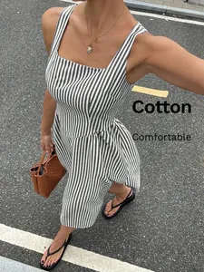Close-up detail of a French style striped sleeveless dress with square neck design