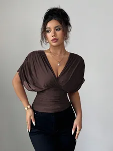 Elegant dark brown deep V-neck flutter sleeve waist-hugging top for fashion-forward women.
