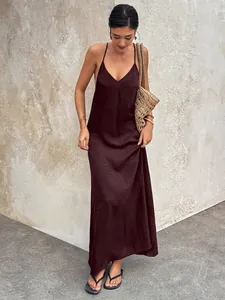 Elegant burgundy satin maxi dress with V-neck and backless spaghetti strap design