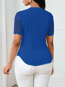 Back view of a blue slim fit ribbed top with elegant lace hollow short sleeves