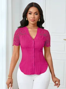 Detail of rose pink slim-fit top with delicate lace shoulders and button-down front
