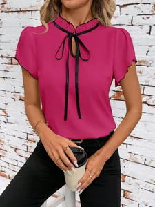 Elegant magenta blouse featuring ruffled neck with black tie and petal sleeves detail