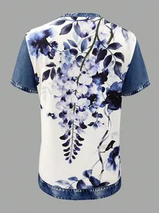Detail view showing the back of women's floral print top with denim patchwork sleeves.