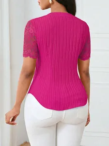 Back view of hot pink ribbed slim fit top featuring delicate lace hollow short sleeves
