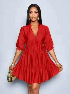 Elegant deep V-neck red mini dress with puff sleeves and pleated skirt details
