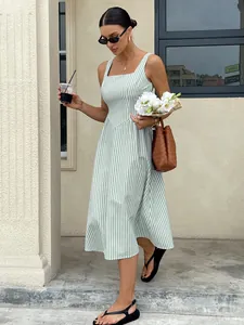 French-style green and white striped midi dress with square neck and waist-slimming fit