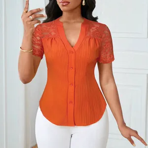 Elegant orange slim fit button-down top featuring intricate lace hollow-out short sleeves