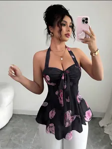 Top corto floral con cuello halter sin mangas a la moda con lazo frontal y cintura acampanada