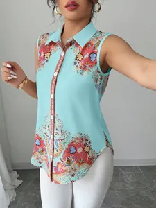 Detail shot of light blue sleeveless shirt with paisley prints and button placket