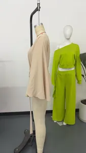 Side view of a beige vintage French top with elegant bell sleeves on a mannequin