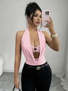 Detail view of a pink deep V-neck halter bodysuit featuring a metal ring cutout.