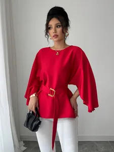 Elegant red French retro blouse featuring flared sleeves and a matching waist belt
