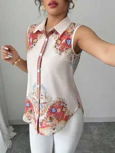 Detail shot of sleeveless button-down blouse with intricate paisley and floral patterns