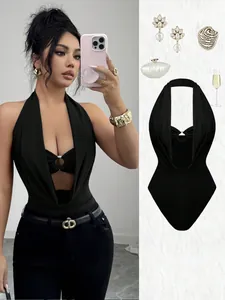 Elegant black halter neck bodysuit featuring a deep V-neck and stylish ring cutout detail