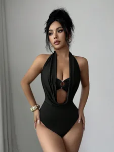 Elegant black deep V-neck halter bodysuit featuring a hollow ring detail and slim fit