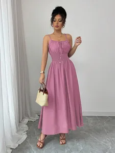 Full length view of elegant purple spaghetti strap midi dress with smocked waist design
