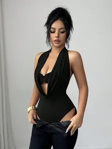 Black deep V halter-neck bodysuit with circular hollow detail for a slim fit look